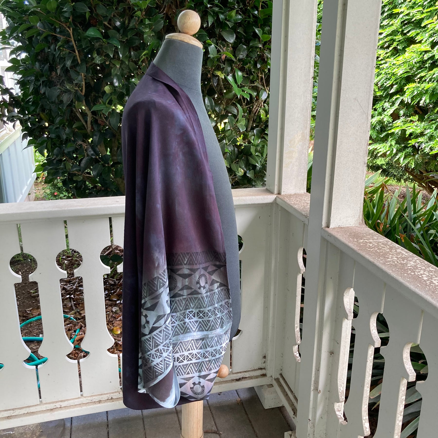 Ohe Kapala Shrug in Maroon with the Mauna