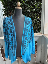 Ohe Kapala U'ilani Shrug In Blue with Lauhala, the Mauna and Lehua