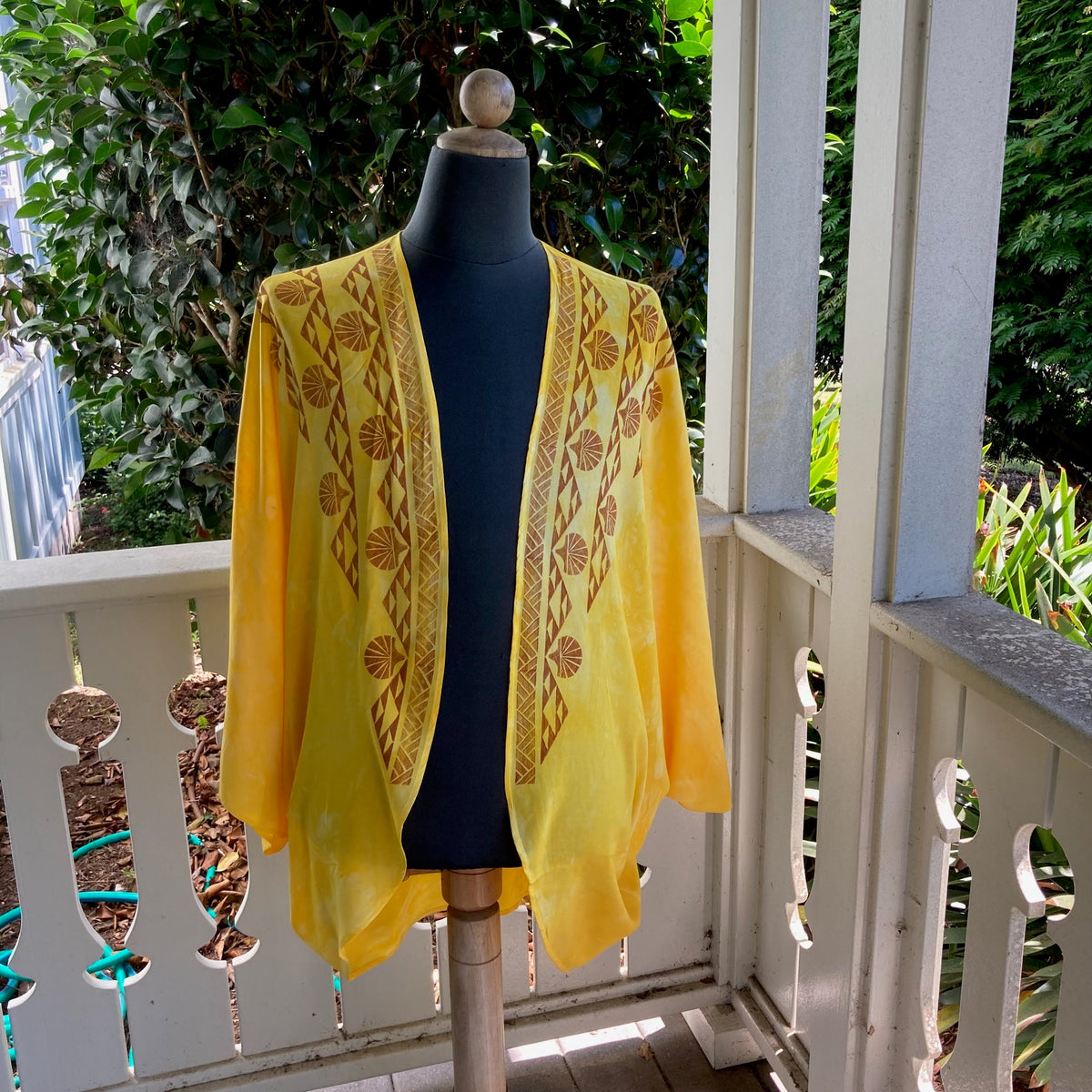Ohe Kapala U'ilani Shrug In Golden Yellow with the Mauna and Lehua