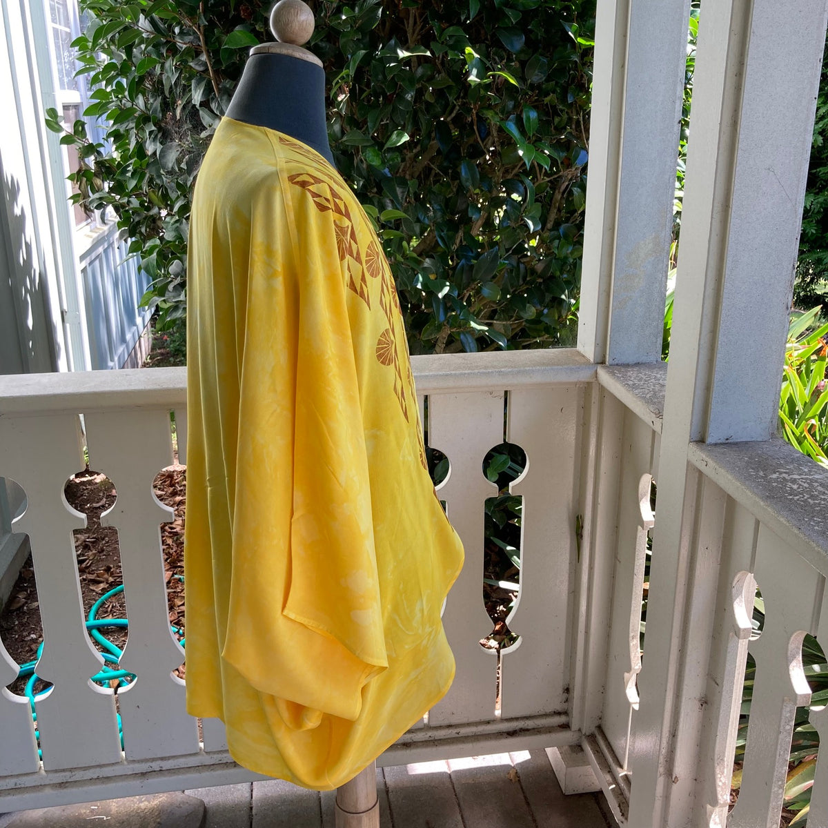 Ohe Kapala U'ilani Shrug In Golden Yellow with the Mauna and Lehua