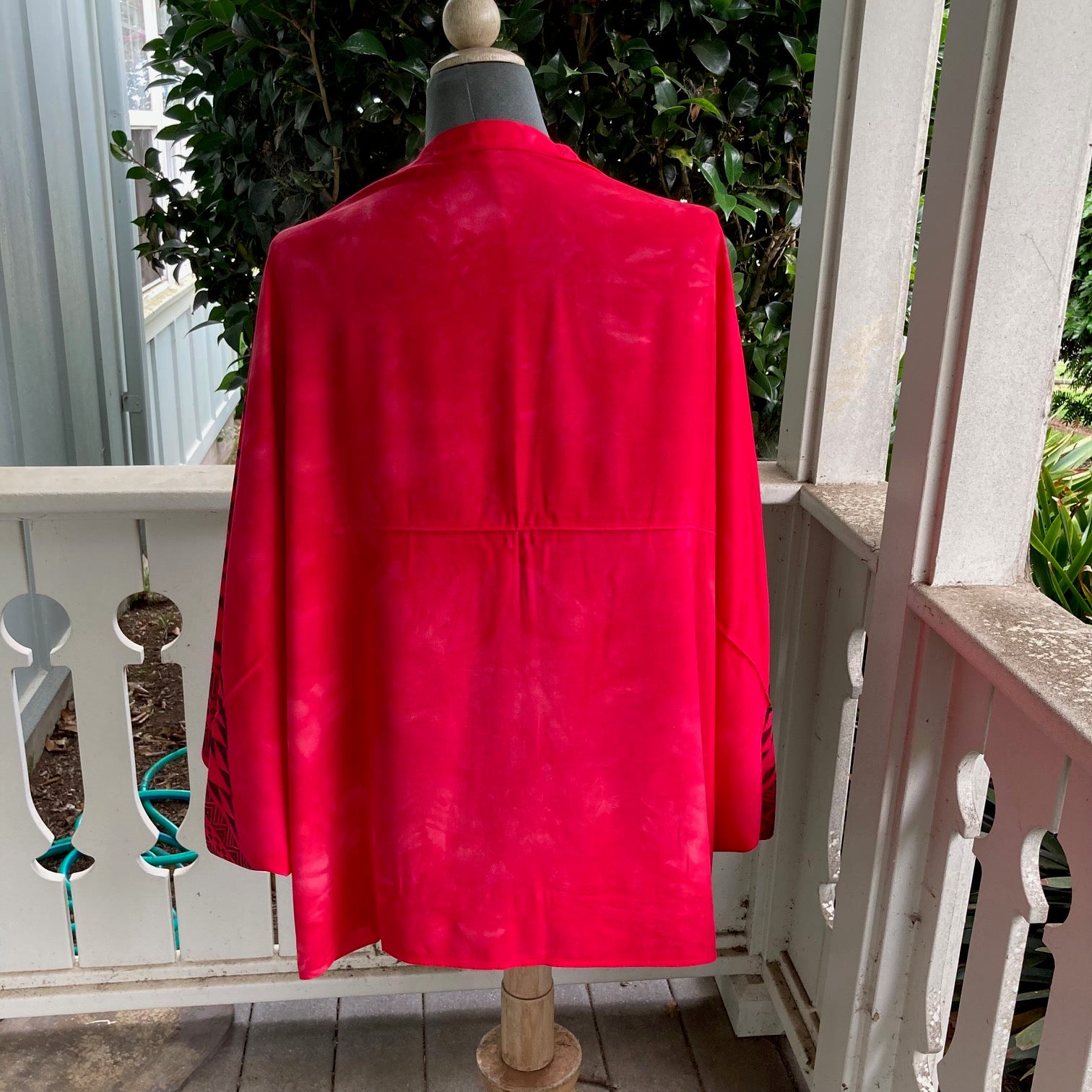 Ohe Kapala Shrug in Red with the Mauna and Lehua
