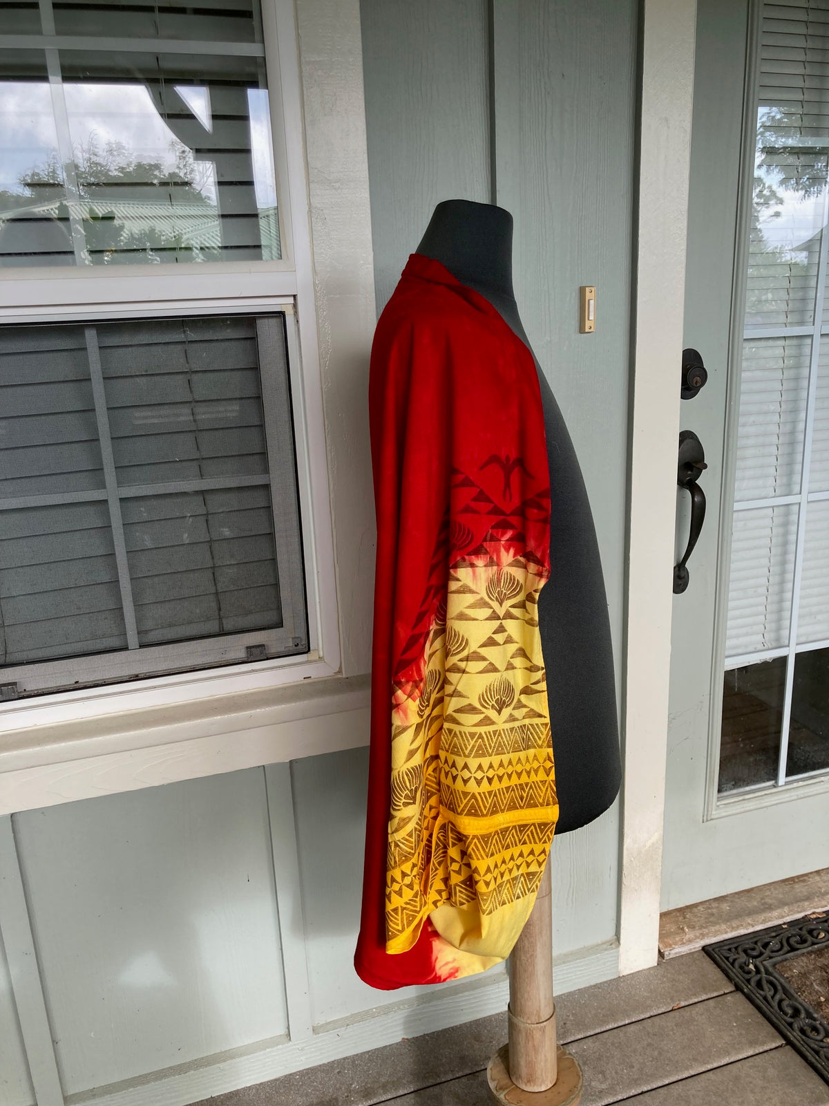 Ohe Kapala Shrug in Red to Yellow Ombre with the Mauna and the Lehua