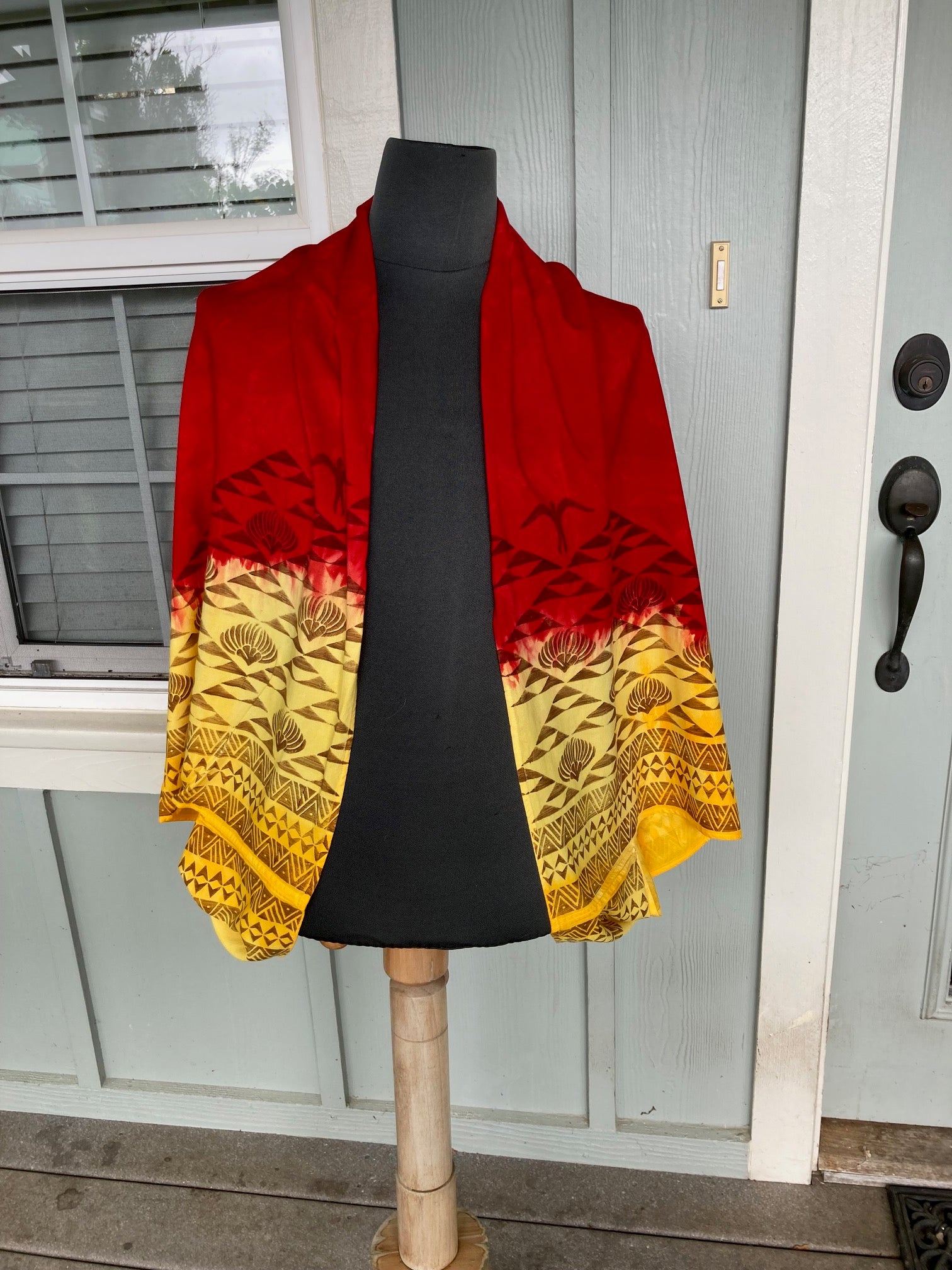 Ohe Kapala Shrug in Red to Yellow Ombre with the Mauna and the Lehua