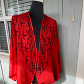 Ohe Kapala U'ilani Shrug In Red with the Mauna and 'Iwa